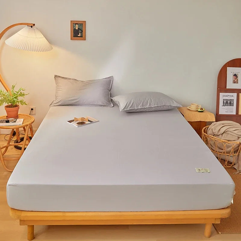 Sábana bajera de algodón 100% con banda elástica, Funda de colchón ajustable antideslizante de Color sólido para cama individual, doble, King y Queen