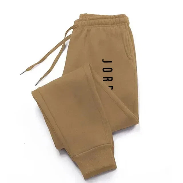 Pantalones de chándal para correr para hombres y mujeres, pantalones de chándal versátiles, ropa informal, nueva moda novedosa para las cuatro estaciones