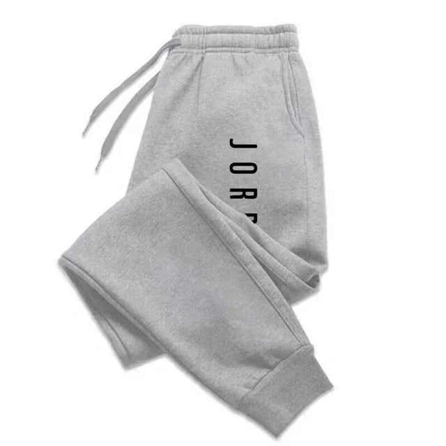 Pantalones de chándal para correr para hombres y mujeres, pantalones de chándal versátiles, ropa informal, nueva moda novedosa para las cuatro estaciones
