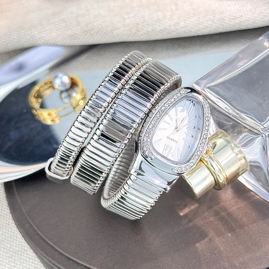 Reloj de aleación serpentina de alta calidad a la moda para mujer con caja de diamantes Reloj de pulsera de cuarzo de alta calidad estilo famoso