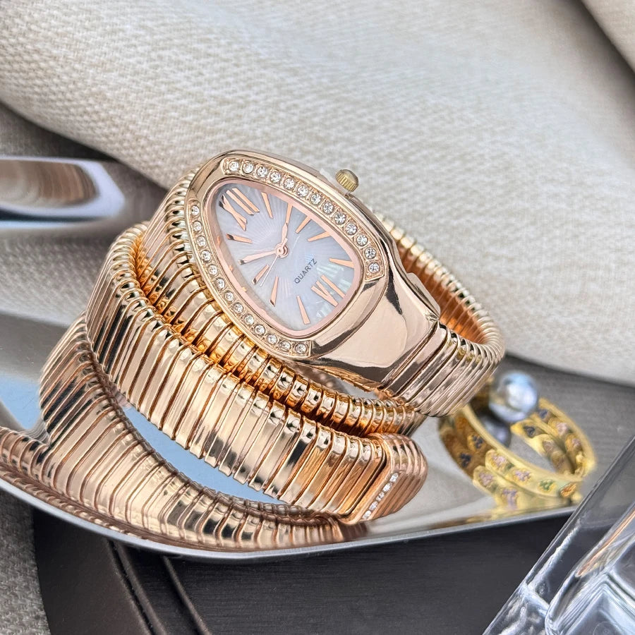 Reloj de aleación serpentina de alta calidad a la moda para mujer con caja de diamantes Reloj de pulsera de cuarzo de alta calidad estilo famoso