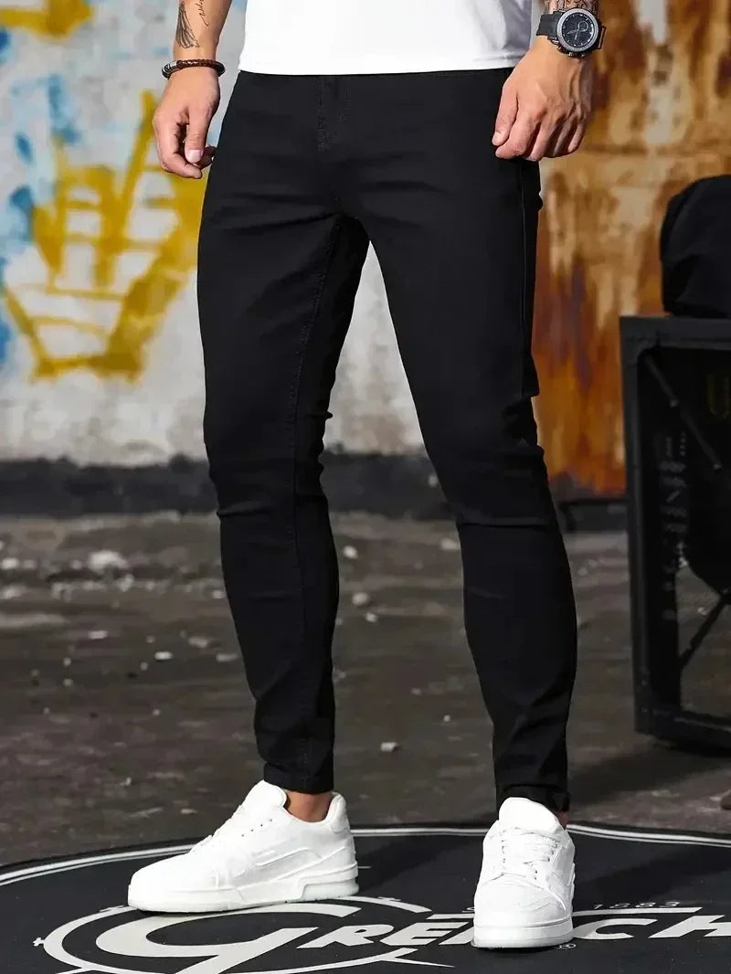 2025 primavera nuevos hombres Slim Fit clásico pantalones vaqueros ajustados Casual estilo callejero Casual hombres pantalones vaqueros ajustados hombre Slim Fit lápiz Denim azul