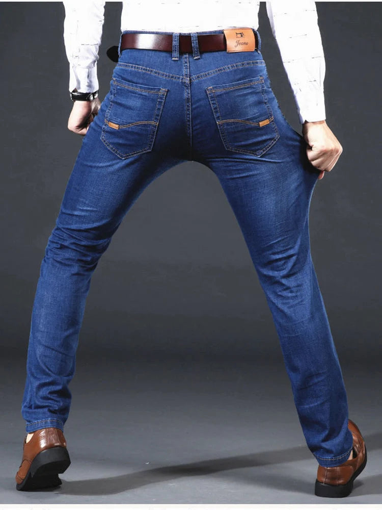 Nuevos pantalones ligeros de lujo elásticos ajustados para hombre, cómodos y suaves pantalones vaqueros informales rectos a la moda de negocios, ropa de marca masculina