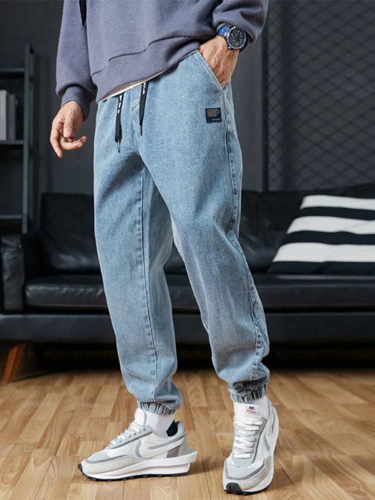 Pantalones vaqueros para correr de talla grande para hombre, ropa de calle 6XL 7XL 8XL, pantalones Cargo de mezclilla informales en negro y azul, pantalones vaqueros cónicos de algodón elásticos, pantalones holgados