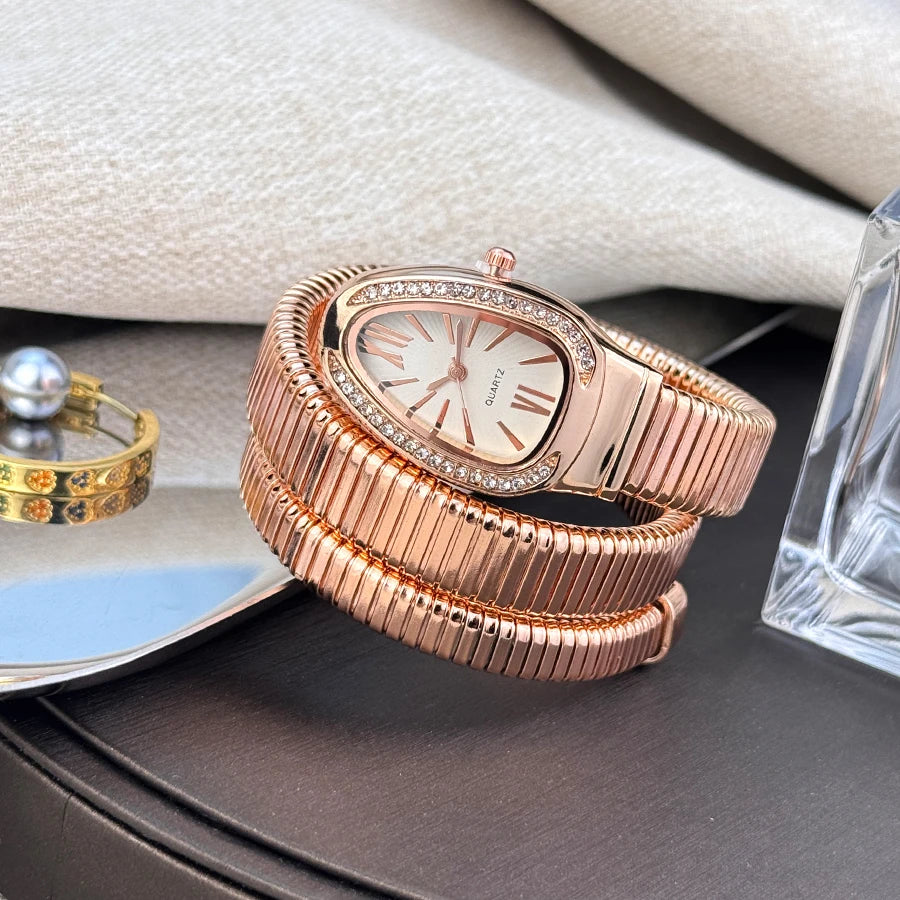 Reloj de aleación serpentina de alta calidad a la moda para mujer con caja de diamantes Reloj de pulsera de cuarzo de alta calidad estilo famoso