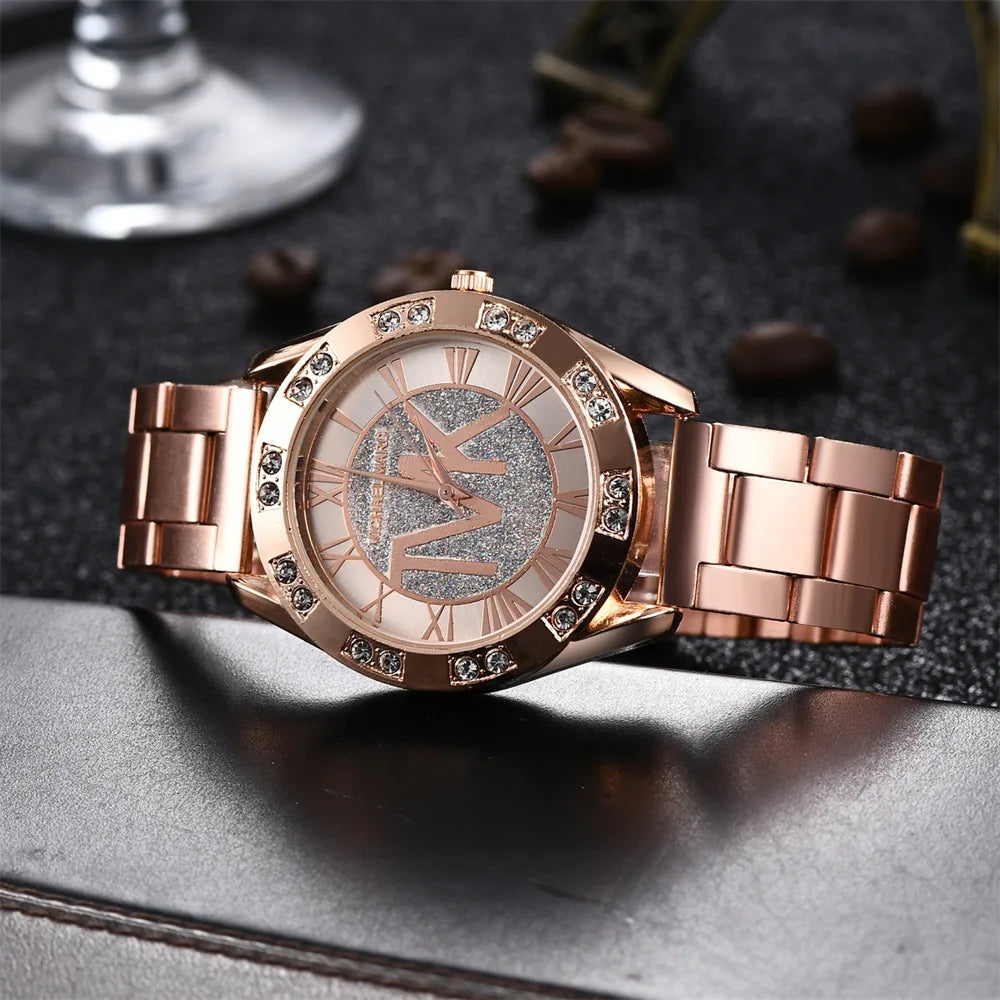 UTHAI-reloj de cuarzo con diamantes para mujer y hombre, pulsera de acero inoxidable con logotipo TVK, dorado, a la moda