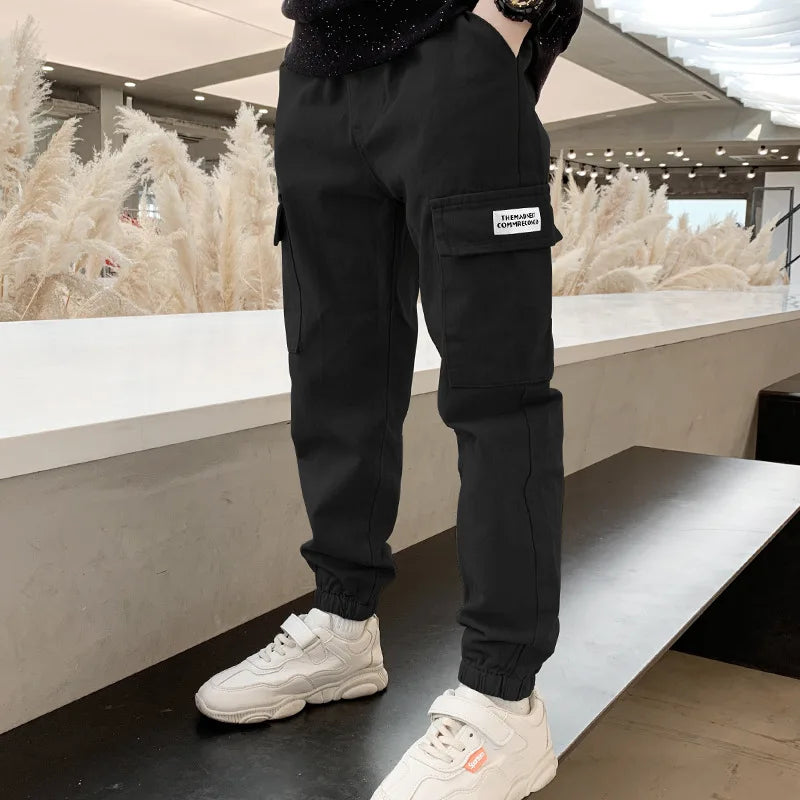 Primavera otoño niños moda guapo pantalones Cargo niños carta deportes pantalones adolescentes Casual pantalones de chándal finos 4-12 años