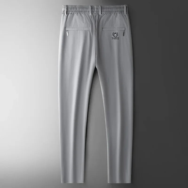 Pantalones informales finos de tela de seda de hielo suave para hombre, pantalón recto de estilo coreano, de alta elasticidad, marca de lujo, verano 2024
