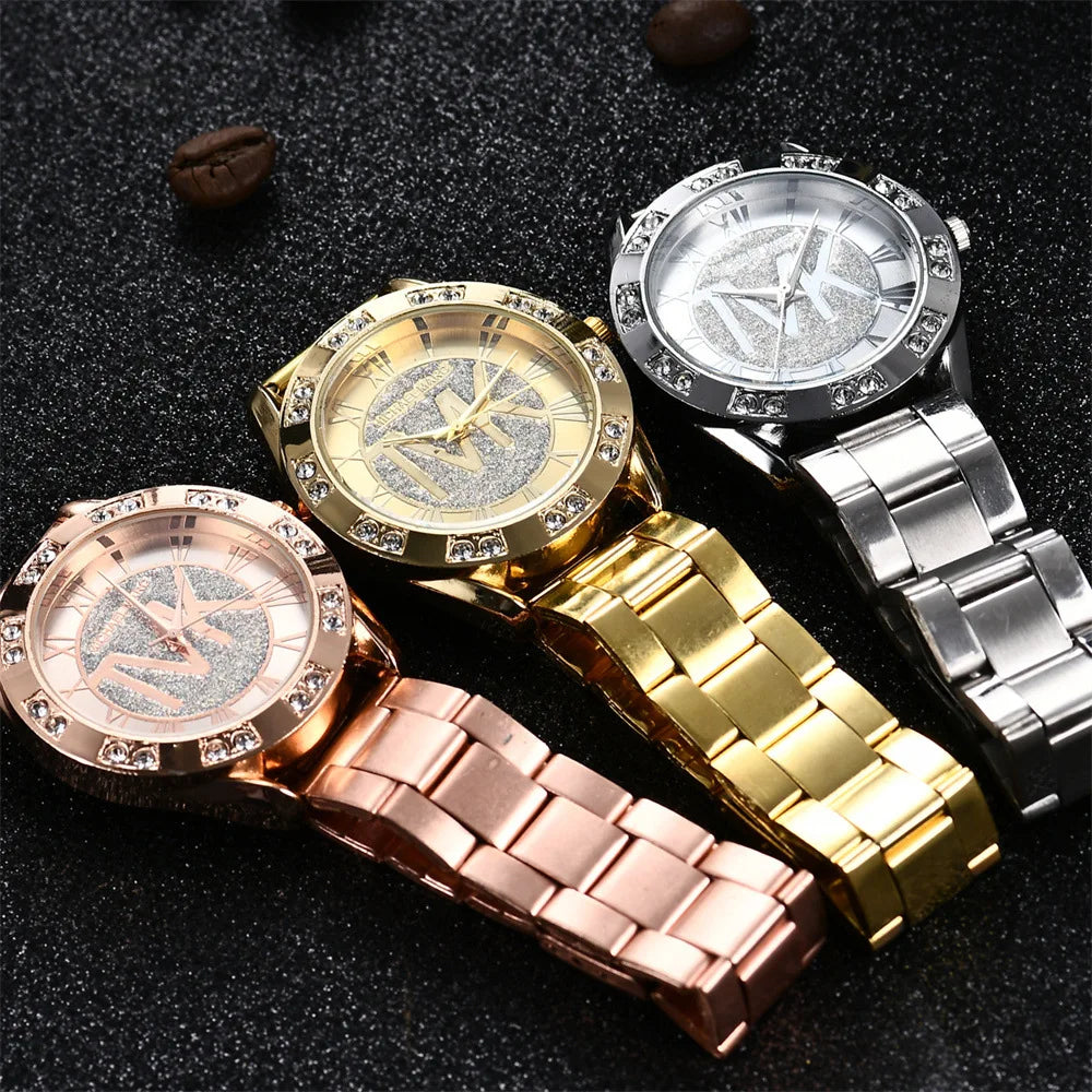 UTHAI-reloj de cuarzo con diamantes para mujer y hombre, pulsera de acero inoxidable con logotipo TVK, dorado, a la moda