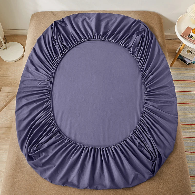 Sábana bajera 100% de algodón con banda elástica, funda de colchón ajustable antideslizante de Color sólido para camas individuales, dobles, King y Queen