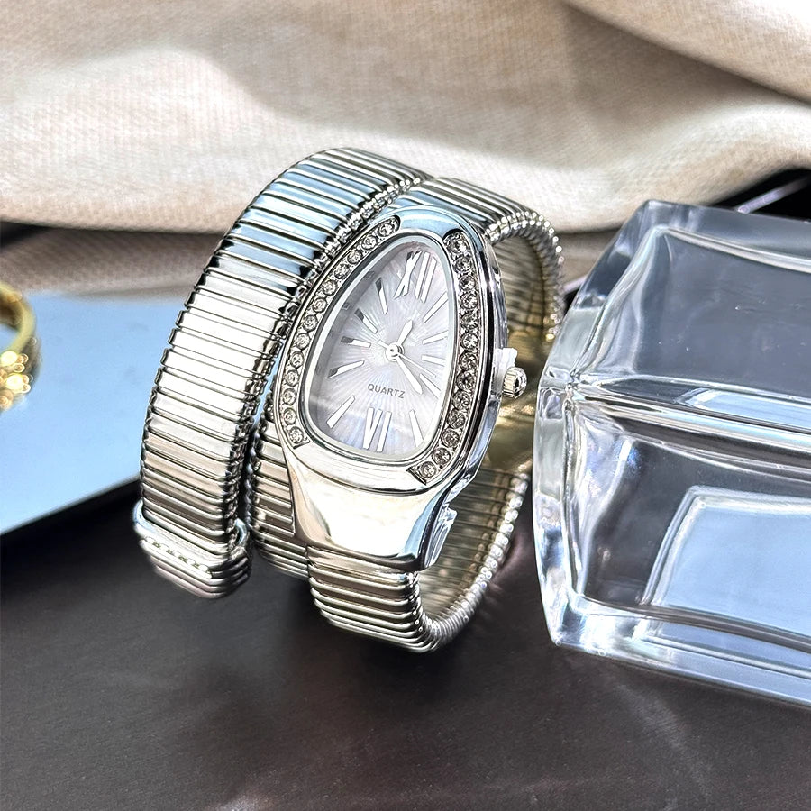 Reloj de aleación serpentina de alta calidad a la moda para mujer con caja de diamantes Reloj de pulsera de cuarzo de alta calidad estilo famoso
