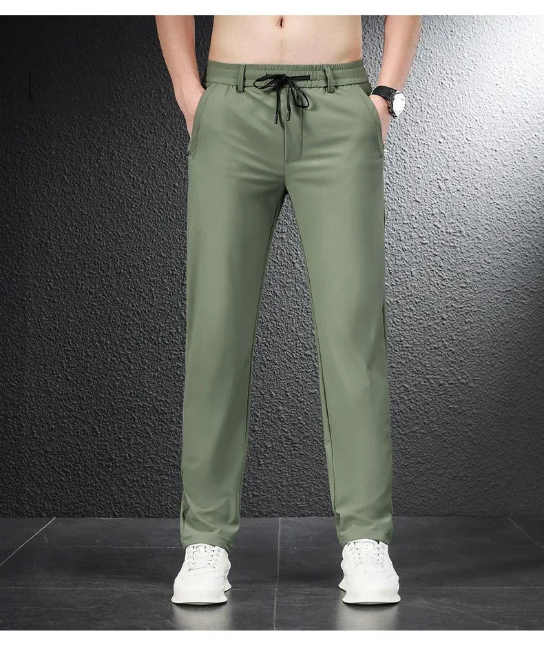 Pantalones informales finos de tela de seda de hielo suave para hombre, pantalón recto de estilo coreano, de alta elasticidad, marca de lujo, verano 2024