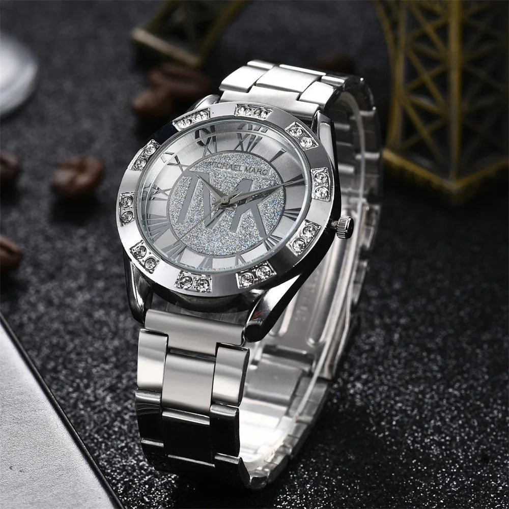 UTHAI-reloj de cuarzo con diamantes para mujer y hombre, pulsera de acero inoxidable con logotipo TVK, dorado, a la moda