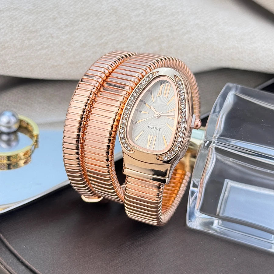 Reloj de aleación serpentina de alta calidad a la moda para mujer con caja de diamantes Reloj de pulsera de cuarzo de alta calidad estilo famoso