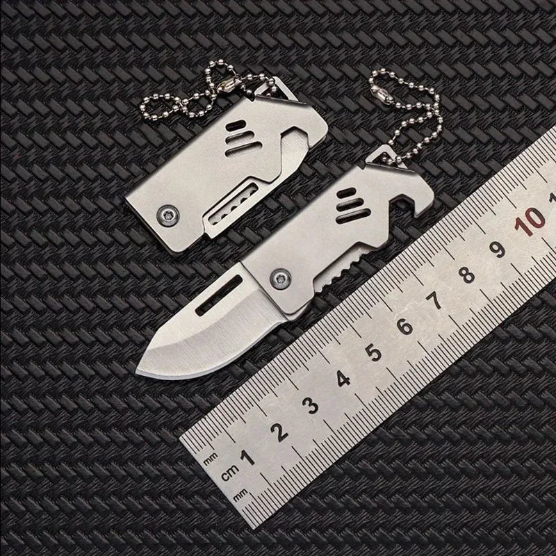 Mini cuchillo plegable de acero, cuchillo de supervivencia portátil para acampar, cuchillo plegable de bolsillo, llavero de autodefensa, colgante, 1 ud.