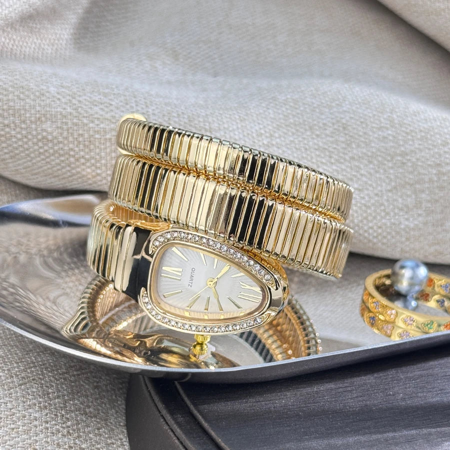 Reloj de aleación serpentina de alta calidad a la moda para mujer con caja de diamantes Reloj de pulsera de cuarzo de alta calidad estilo famoso