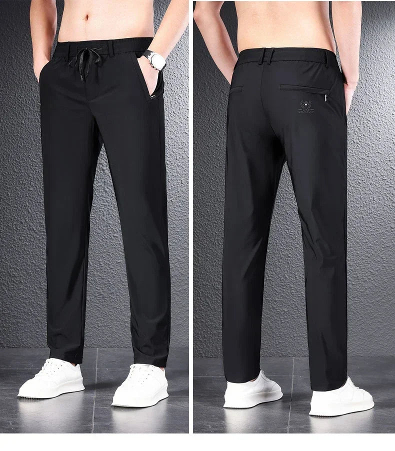 Pantalones informales finos de tela de seda de hielo suave para hombre, pantalón recto de estilo coreano, de alta elasticidad, marca de lujo, verano 2024