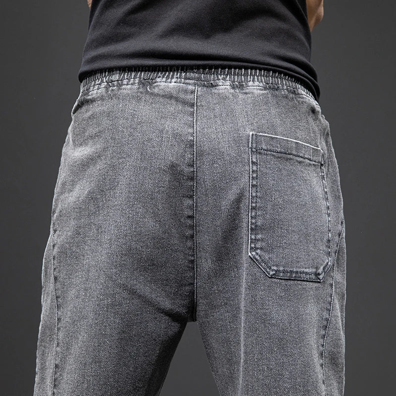 Primavera Verano negro azul Cargo Jeans hombres ropa de calle Denim Jogger pantalones hombres holgados Harem Jean pantalones de talla grande