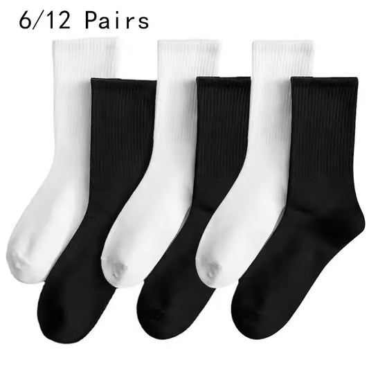 6/12 pares de calcetines de tubo medio para hombre Color sÃ³lido en blanco y negro ropa de calle Harajuku moda calcetines transpirables e informales