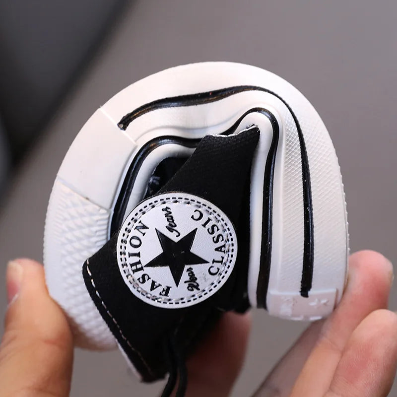Zapatos de lona de caña media para niños, zapatos informales cómodos de fondo suave para niños y niñas, zapatos de tablero transpirables antideslizantes