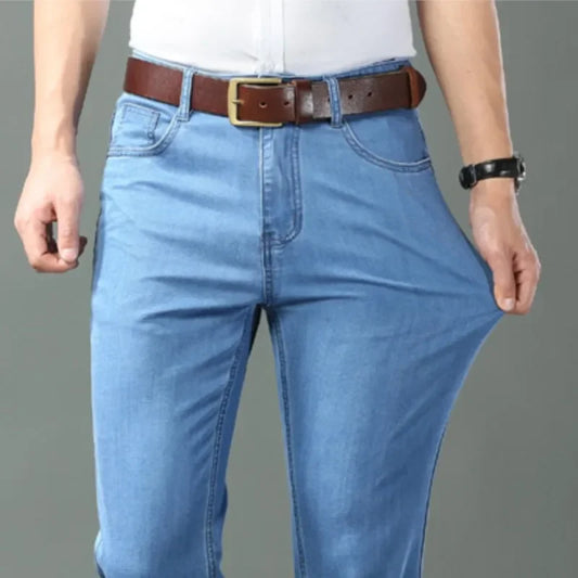 Nuevos pantalones vaqueros finos de seda de hielo para hombres, pantalones de algodÃ³n elÃ¡sticos rectos azules, pantalones ligeros informales de negocios para primavera y verano