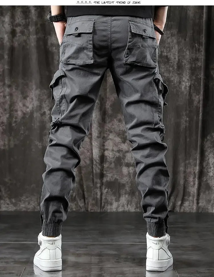 Pantalones Cargo de moda para hombre, pantalones ajustados de estilo informal, holgados, estilo americano, pantalones de pie pequeños con múltiples bolsillos, color negro, primavera y otoño
