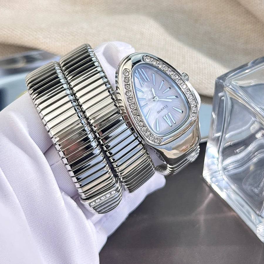 Reloj de aleación serpentina de alta calidad a la moda para mujer con caja de diamantes Reloj de pulsera de cuarzo de alta calidad estilo famoso