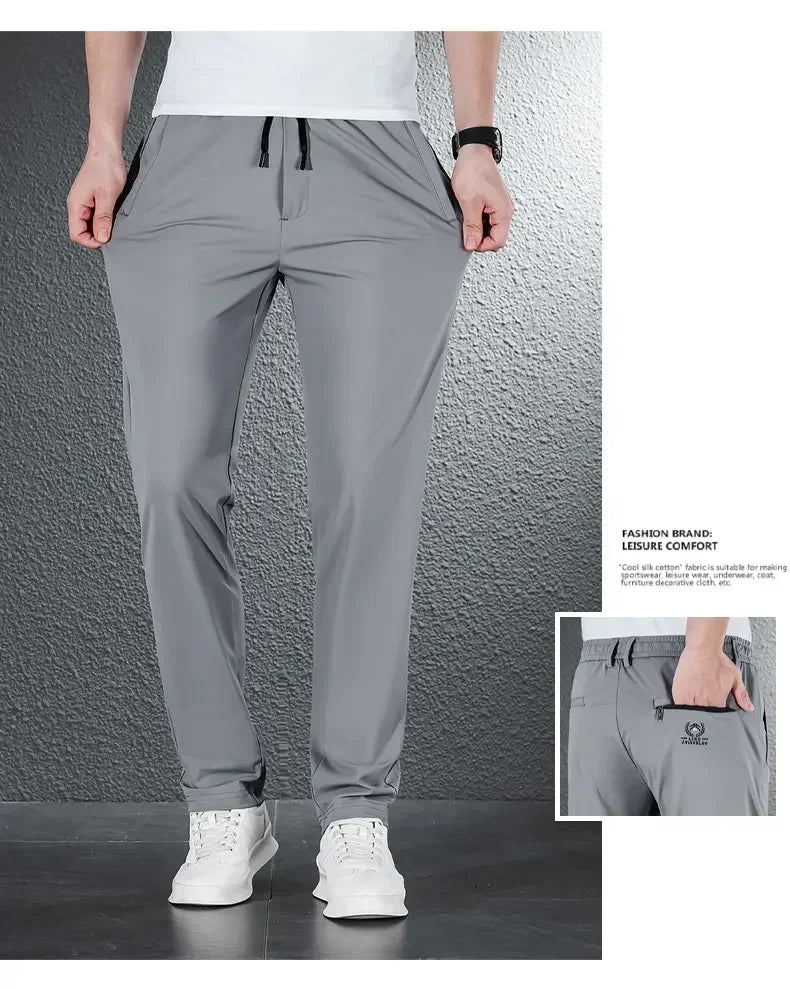 Pantalones informales finos de tela de seda de hielo suave para hombre, pantalón recto de estilo coreano, de alta elasticidad, marca de lujo, verano 2024