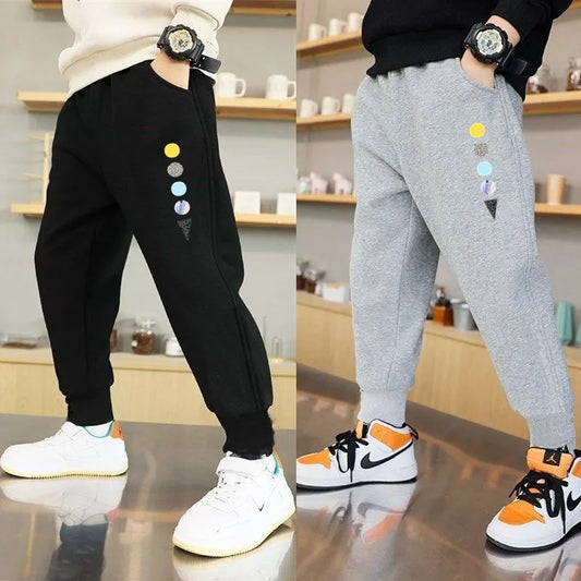 Pantalones de algodón para primavera y otoño para niños, pantalones deportivos de ocio para bebés, pantalones con estampado de planeta espacial para niños, pantalones de chándal para estudiantes de 3 a 14 años