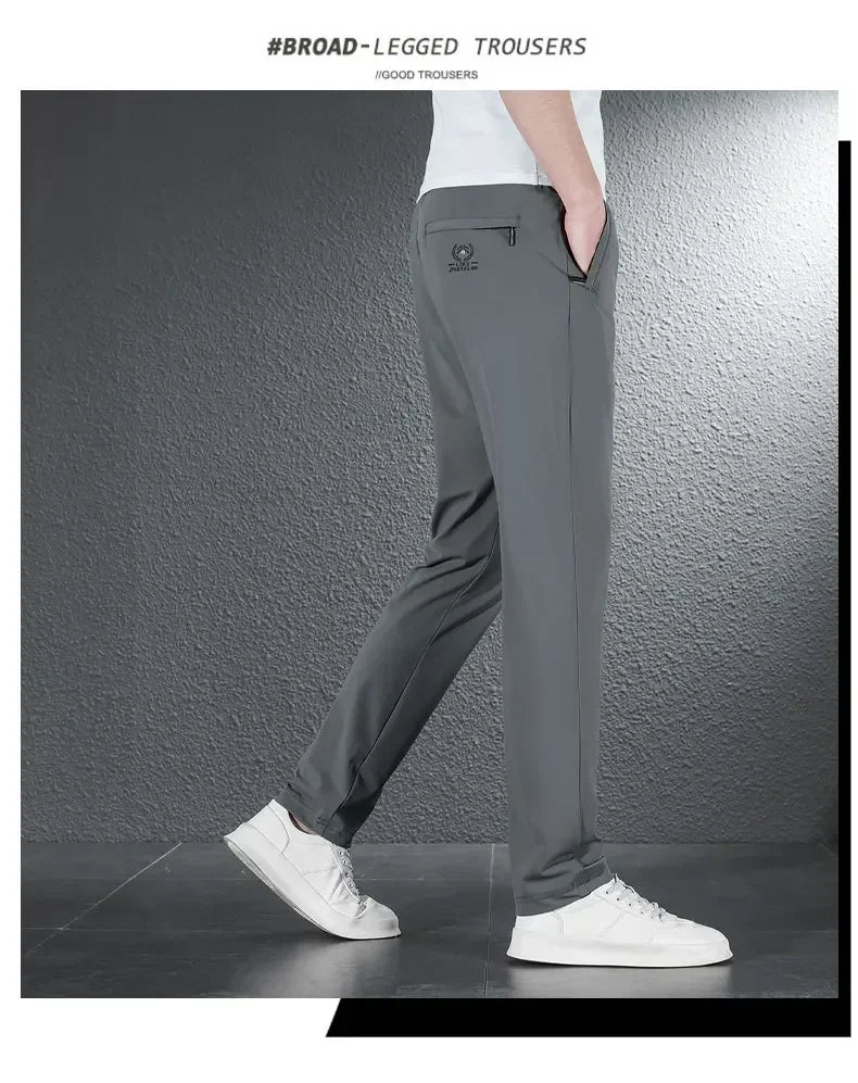 Pantalones informales finos de tela de seda de hielo suave para hombre, pantalón recto de estilo coreano, de alta elasticidad, marca de lujo, verano 2024