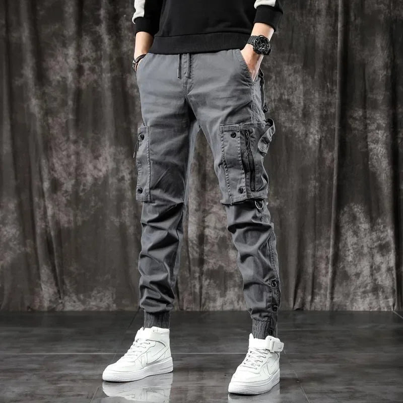 Pantalones Cargo de moda para hombre, pantalones ajustados de estilo informal, holgados, estilo americano, pantalones de pie pequeños con múltiples bolsillos, color negro, primavera y otoño