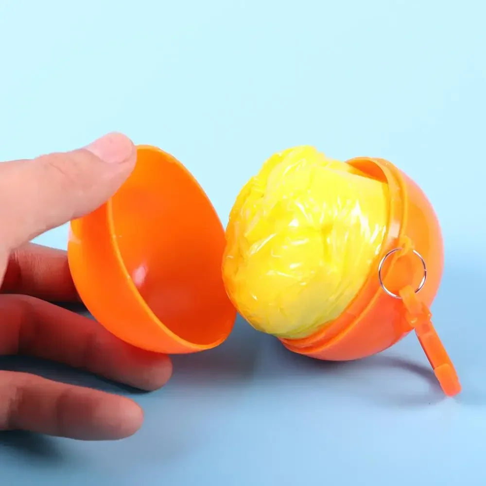 Chubasquero desechable portátil, llavero con bola de compresión, bolsillo para exteriores, Poncho colgante de viaje para adultos, equipo de acampada